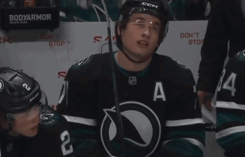 A Hockey Player Wearing A Jersey That Says A On It GIF