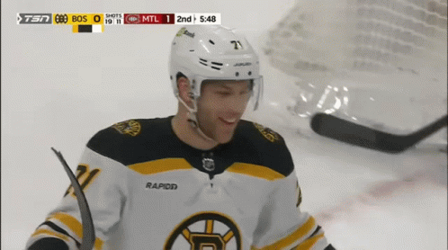 A Hockey Player Wearing A Jersey That Says Rapid On The Back GIF
