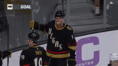 A Hockey Player Wearing A Jersey That Says Vegas GIF