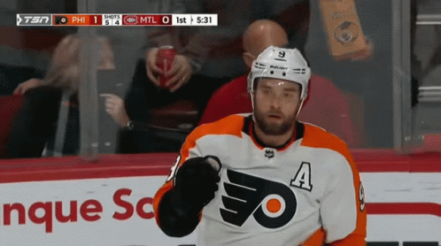 A Hockey Player Wearing A Jersey With A Flyers Logo GIF