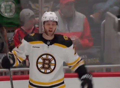 A Hockey Player Wearing A Jersey With A Letter B On It GIF