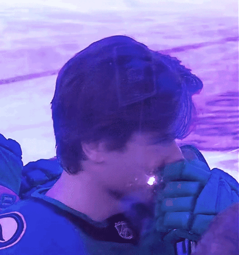 A Hockey Player Wearing A Jersey With The Letter D On It GIF