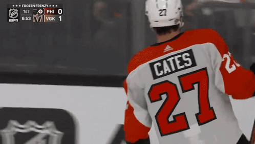 A Hockey Player Wearing A Jersey With The Name Cates On It GIF