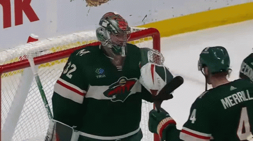A Hockey Player Wearing A Jersey With The Number 32 On It GIF