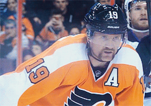 A Hockey Player Wearing A Jersey With The Number 4 On It GIF