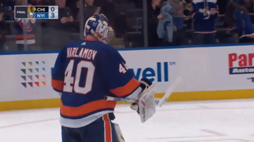 A Hockey Player Wearing A Number 40 Jersey GIF
