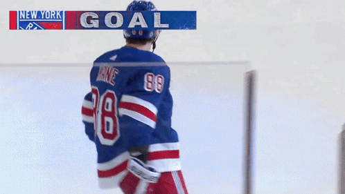 A Hockey Player Wearing A Number 88 Jersey GIF