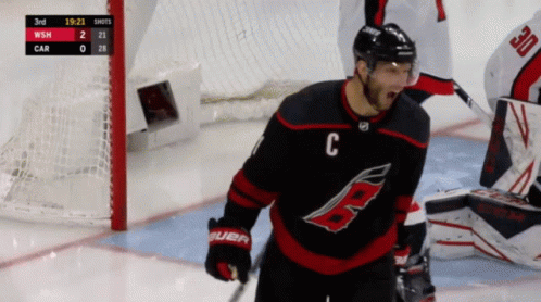 A Hockey Player With The Letter C On His Shirt GIF