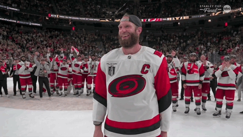 A Hockey Player With The Letter C On His Shirt GIF