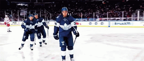 A Hockey Player With The Letter T On His Uniform GIF