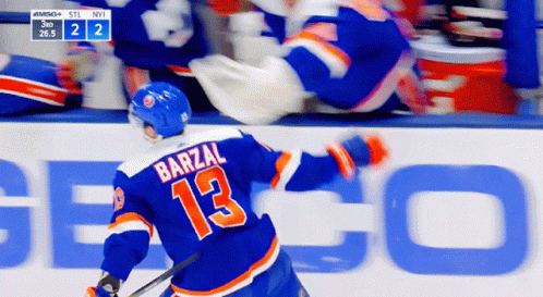 A Hockey Player With The Name Barzal On His Back GIF
