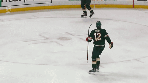 A Hockey Player With The Name Boldy On His Back GIF