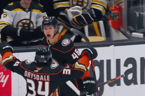 A Hockey Player With The Name Drysdale On His Jersey Is Celebrating A Goal GIF