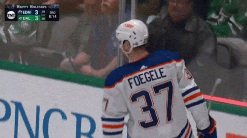 A Hockey Player With The Name Foggele On His Jersey GIF