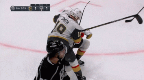 A Hockey Player With The Name Smith On His Back GIF