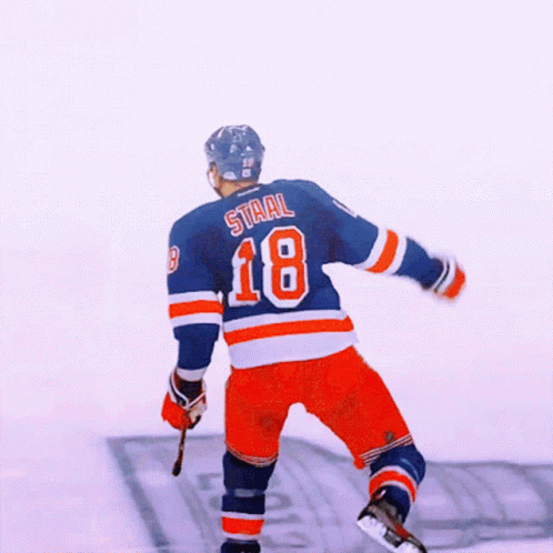 A Hockey Player With The Name Staal On His Back GIF