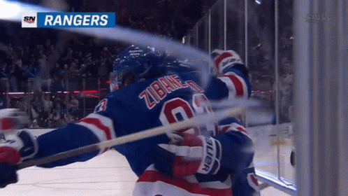 A Hockey Player With The Name Zibane On The Back GIF