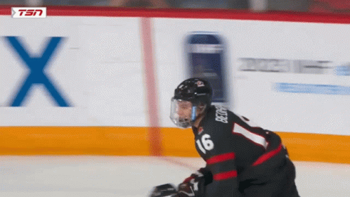 A Hockey Player With The Number 16 On His Back GIF