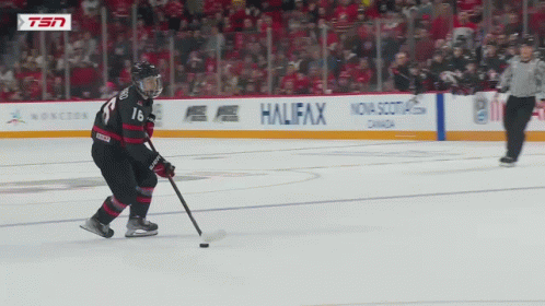 A Hockey Player With The Number 16 On His Shirt GIF
