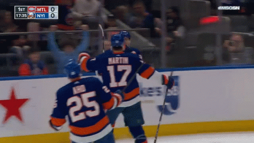 A Hockey Player With The Number 17 On Their Jersey GIF