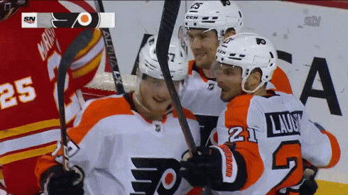 A Hockey Player With The Number 21 On The Back Of His Shirt GIF