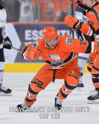 A Hockey Player With The Number 22 On His Jersey Is Standing On The Ice GIF
