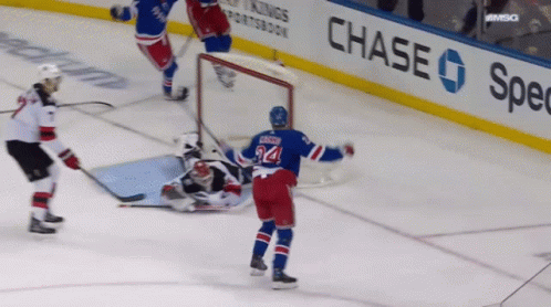 A Hockey Player With The Number 24 On Their Jersey GIF