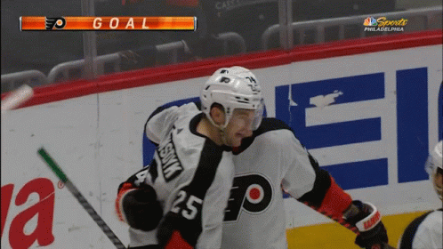 A Hockey Player With The Number 25 On The Back Of His Shirt GIF