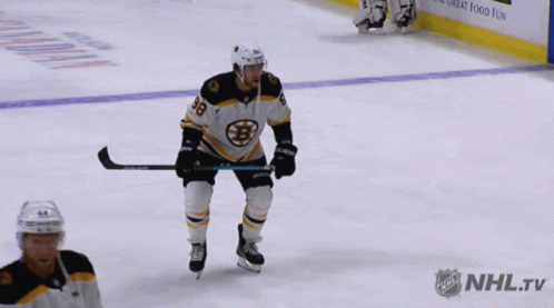 A Hockey Player With The Number 28 On Their Jersey GIF