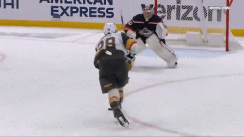 A Hockey Player With The Number 28 On Their Jersey GIF