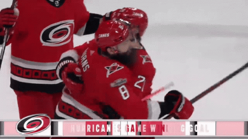 A Hockey Player With The Number 28 On Their Jersey GIF