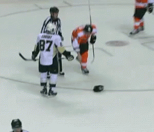 A Hockey Player With The Number 32 On His Back GIF