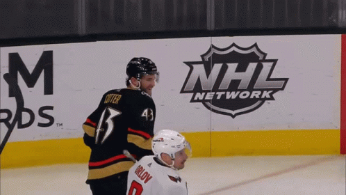 A Hockey Player With The Number 43 On His Jersey Stands In Front Of A Nhl Network Sign GIF