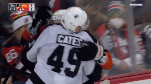 A Hockey Player With The Number 45 On Their Jersey GIF
