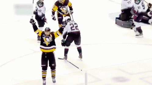 A Hockey Player With The Number 7 On His Jersey Is Kneeling On The Ice GIF