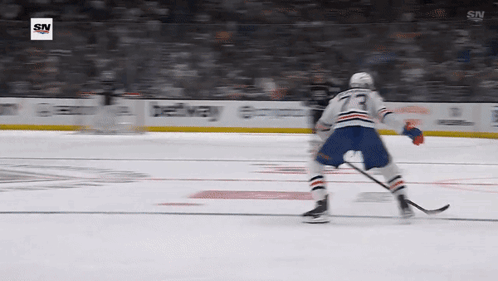 A Hockey Player With The Number 73 On His Back GIF