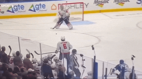 A Hockey Player With The Number 79 On The Back Of His Jersey GIF