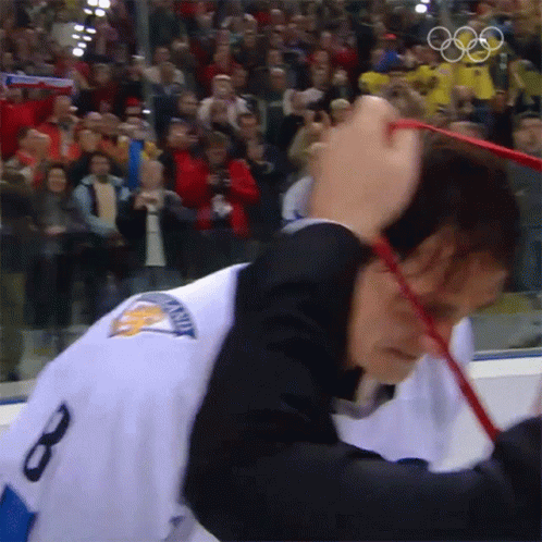 A Hockey Player With The Number 8 On The Back Of His Shirt GIF