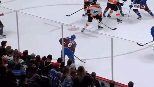 a hockey player with the number 8 on their back