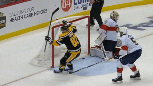 A Hockey Player With The Number 81 On His Shirt GIF
