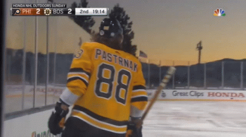 A Hockey Player With The Number 88 On His Jersey Stands On The Ice GIF
