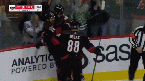 A Hockey Player With The Number 88 On Their Back GIF