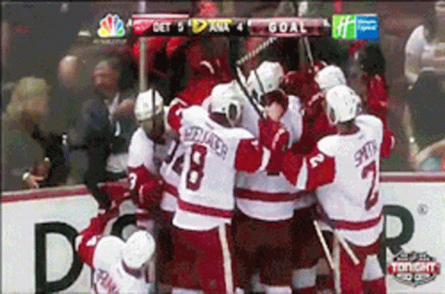 A Hockey Team Celebrates A Goal On Nbc GIF