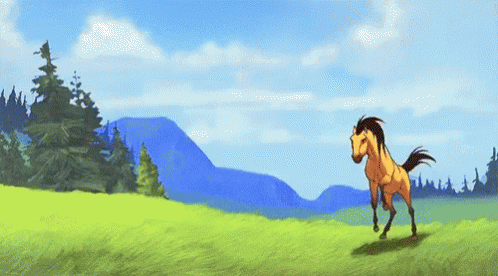 A Horse Is Running In A Grassy Field With Mountains In The Background . GIF