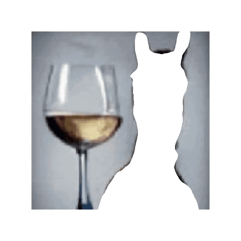 A Horse Wearing A Bridle Is Standing Next To A Glass Of Wine . GIF