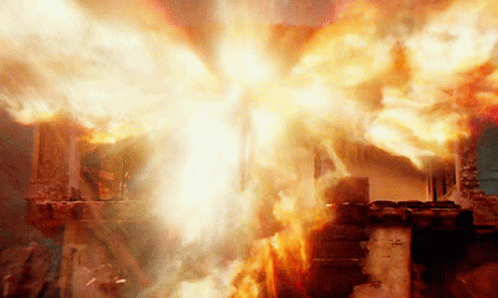A House Is On Fire With A Lot Of Flames GIF