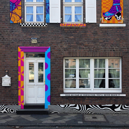 A House With A Sign That Says Have No Fear Of Perfection GIF