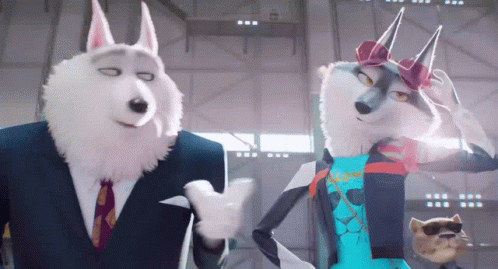 A Husky And A Fox Are Standing Next To Each Other In A Room GIF