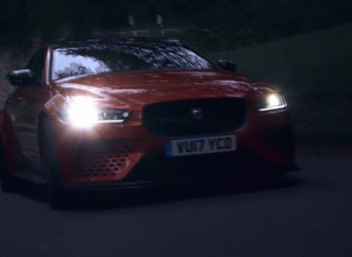 A Jaguar Car With A License Plate That Says Vuji7 Ycd GIF