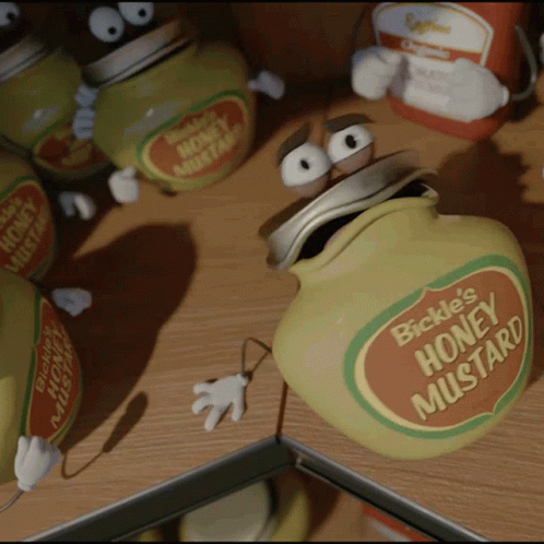 A Jar Of Bickel 'S Honey Mustard With A Cartoon Face On It GIF